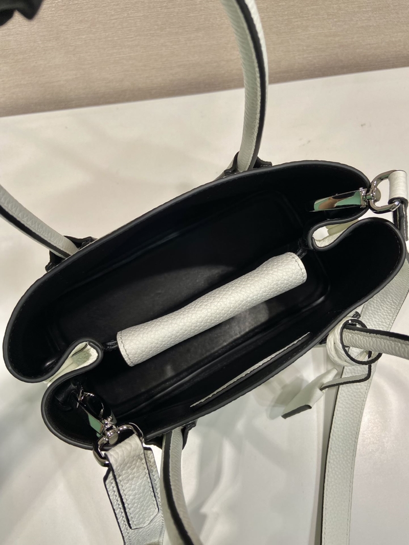 Pra*a top handle bags